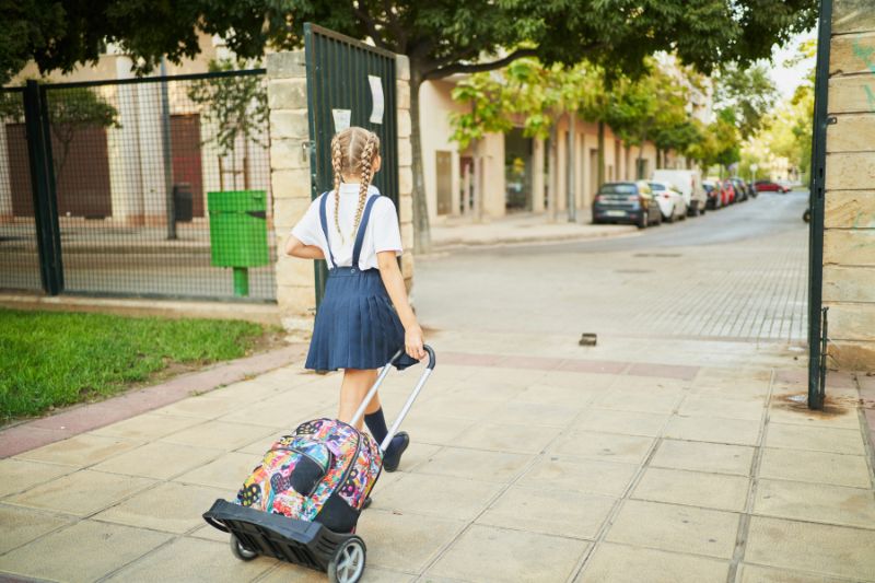 Schoolgirl leaving school in Spain Schoolgirl leaving school in Spain